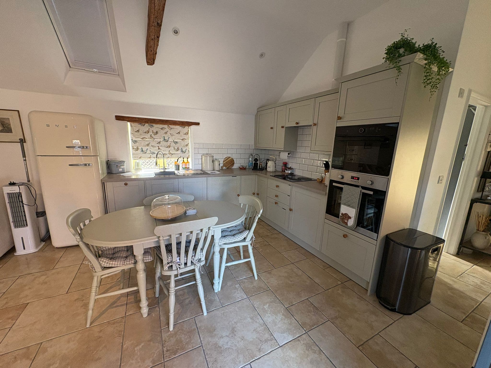 Sage-green cottage kitchen